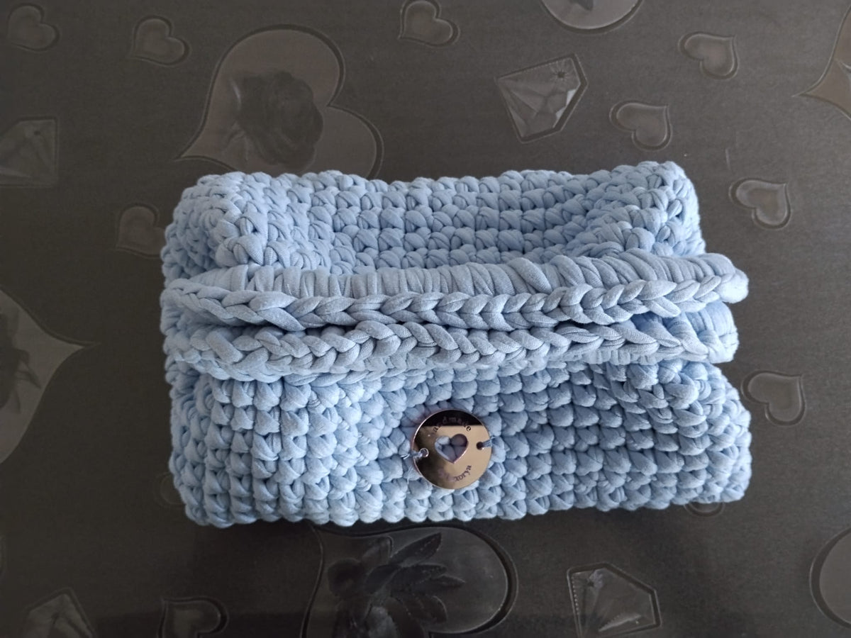 borsa clutch celeste