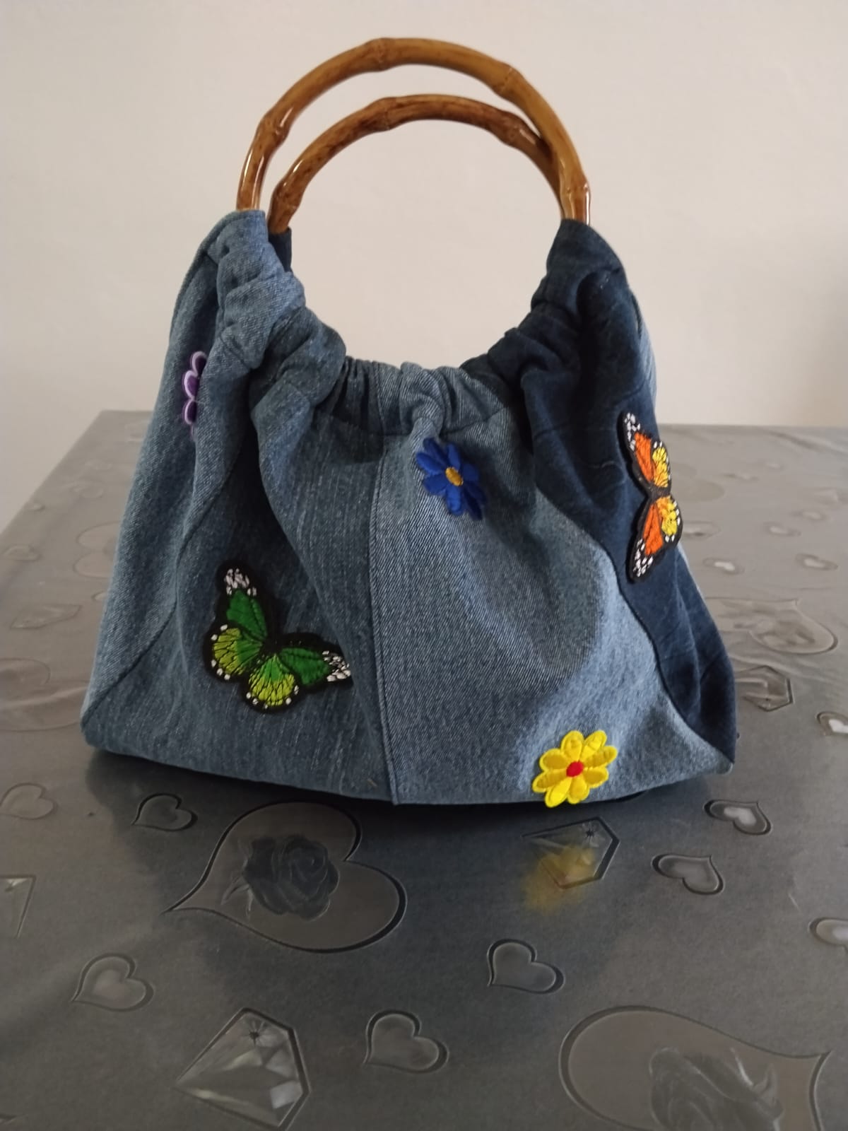 Borsa con manico di legno in denim
