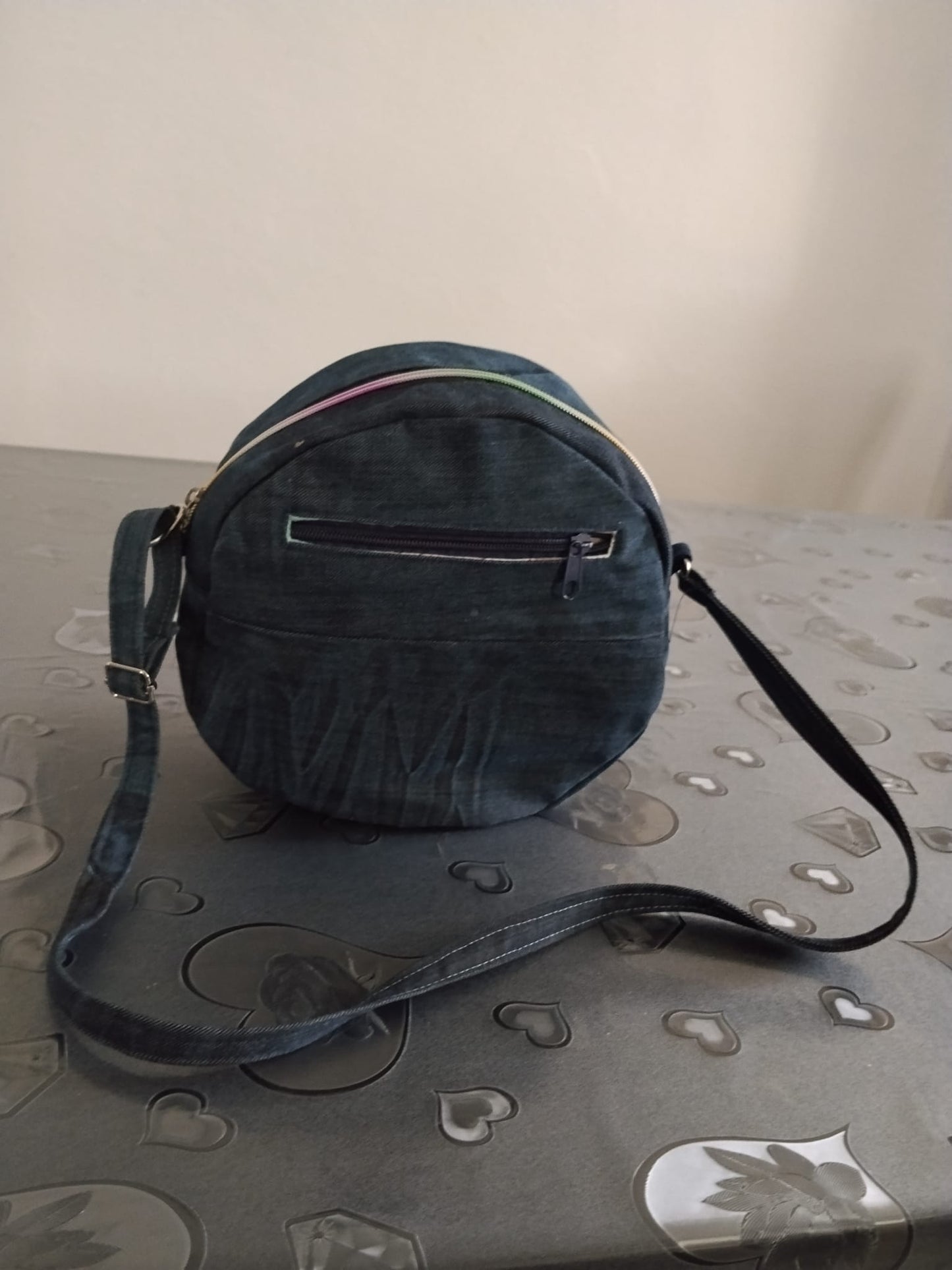 Borsa tonda in denim con fiore