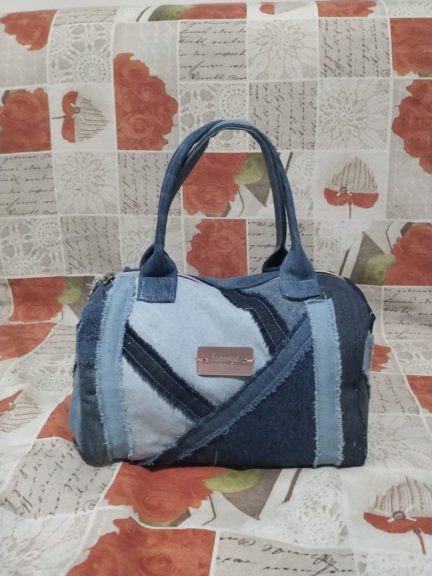 Borsa baulino in denim