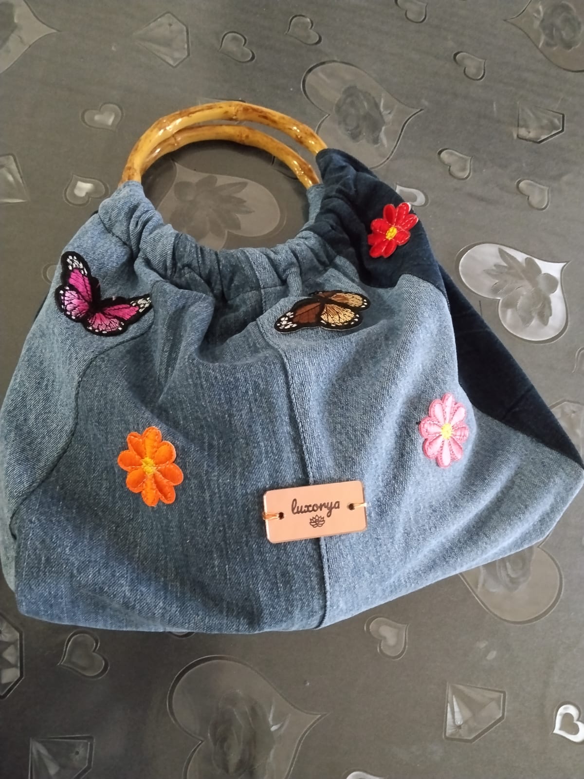 Borsa con manico di legno in denim