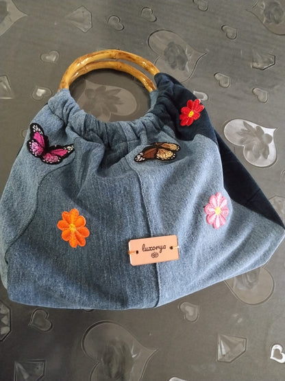 Borsa con manico di legno in denim