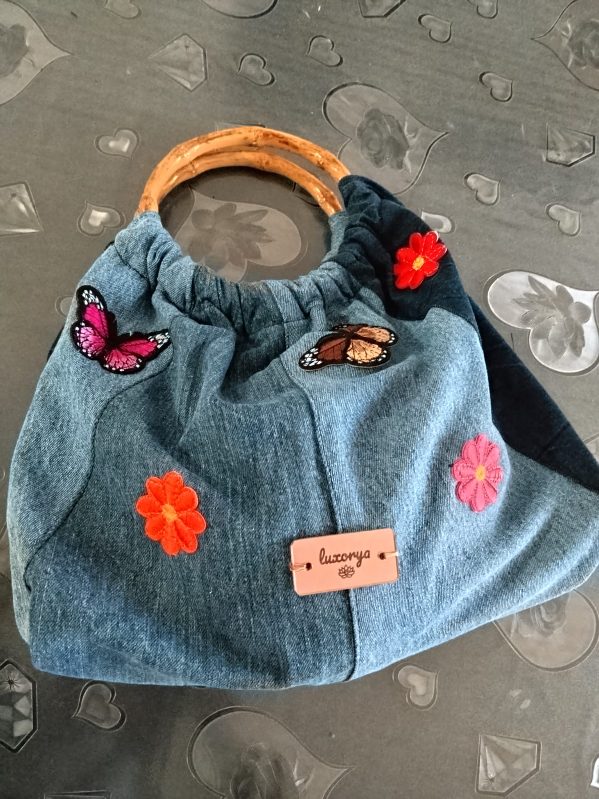 Borsa con manico di legno in denim