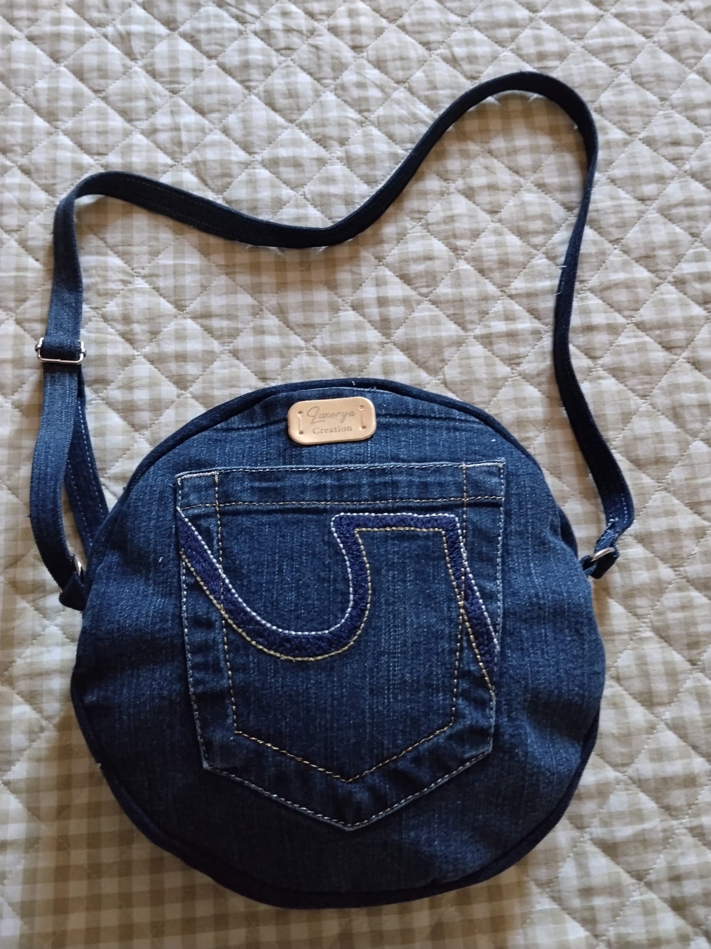 borsa tonda in denim con tasca