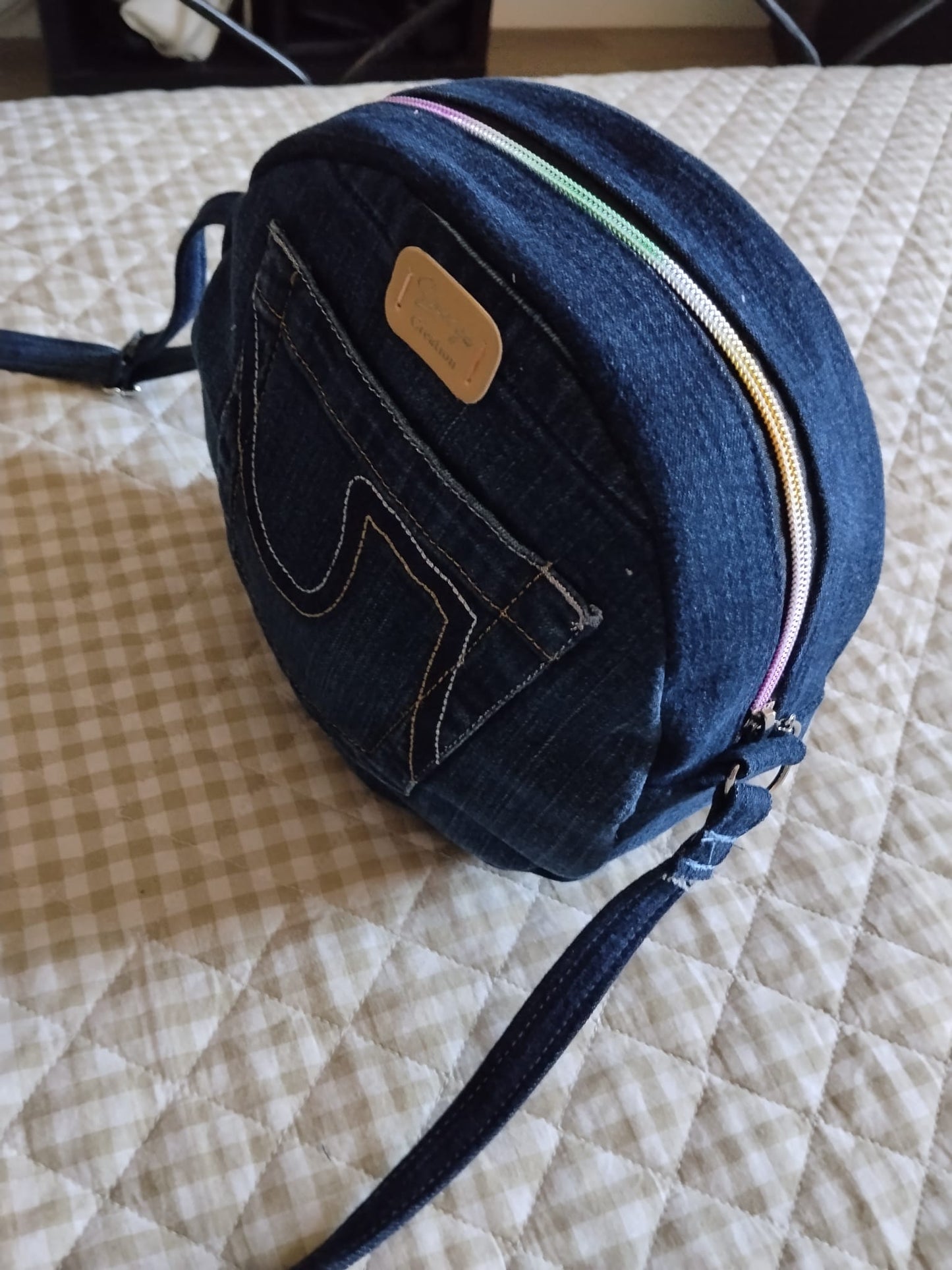 borsa tonda in denim con tasca