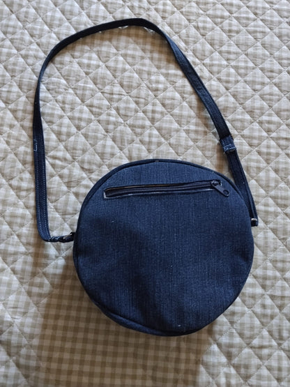borsa tonda in denim con tasca