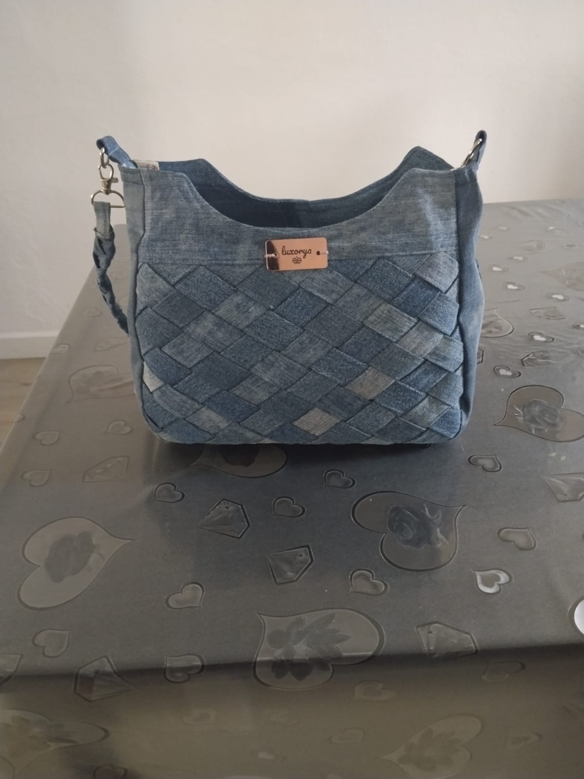 borsa con tracolla a treccia