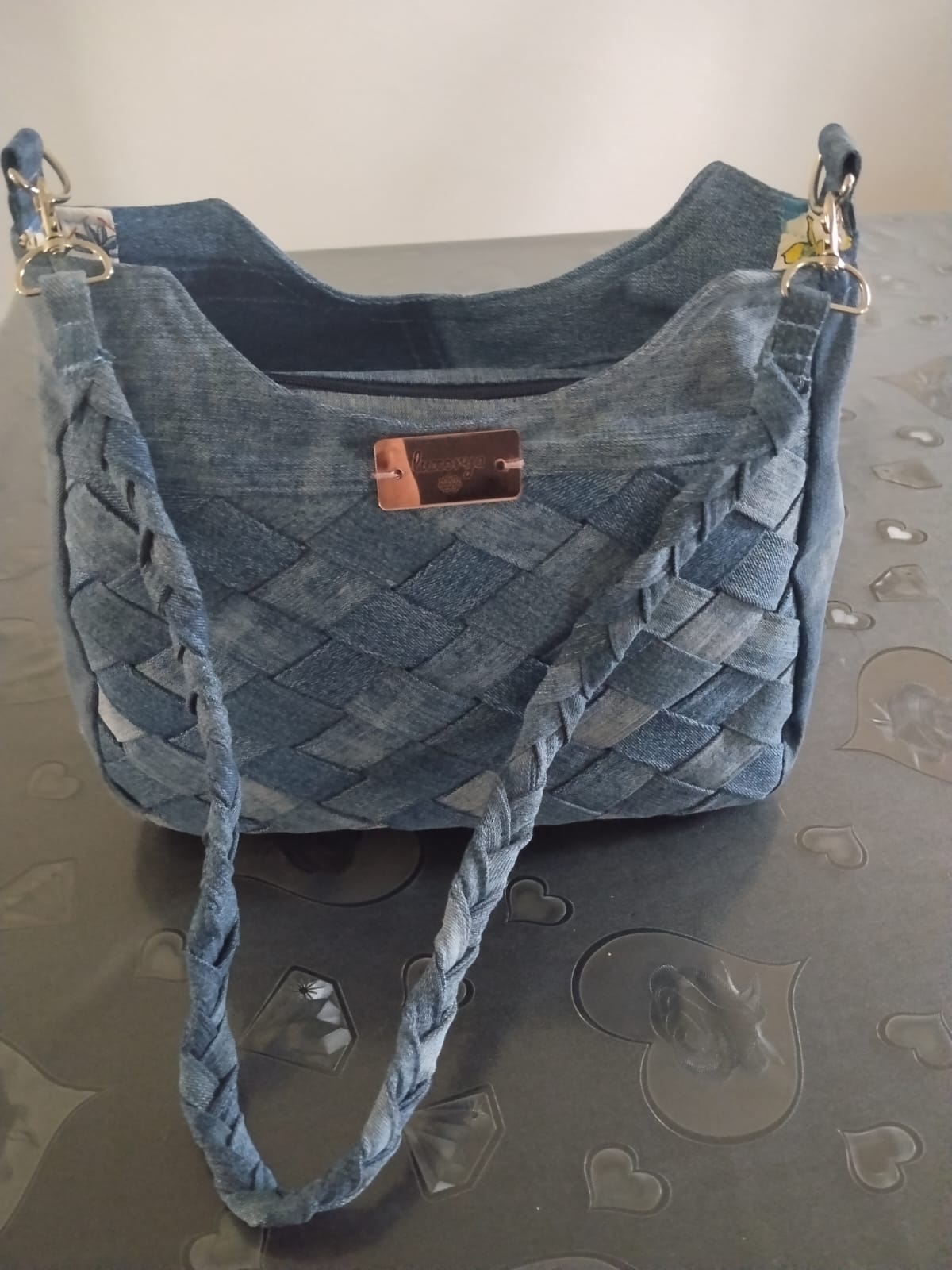 borsa con tracolla a treccia