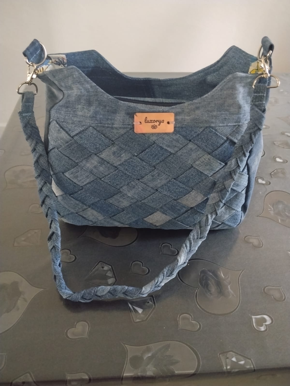 borsa con tracolla a treccia
