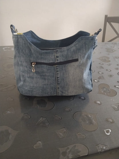 borsa con tracolla a treccia